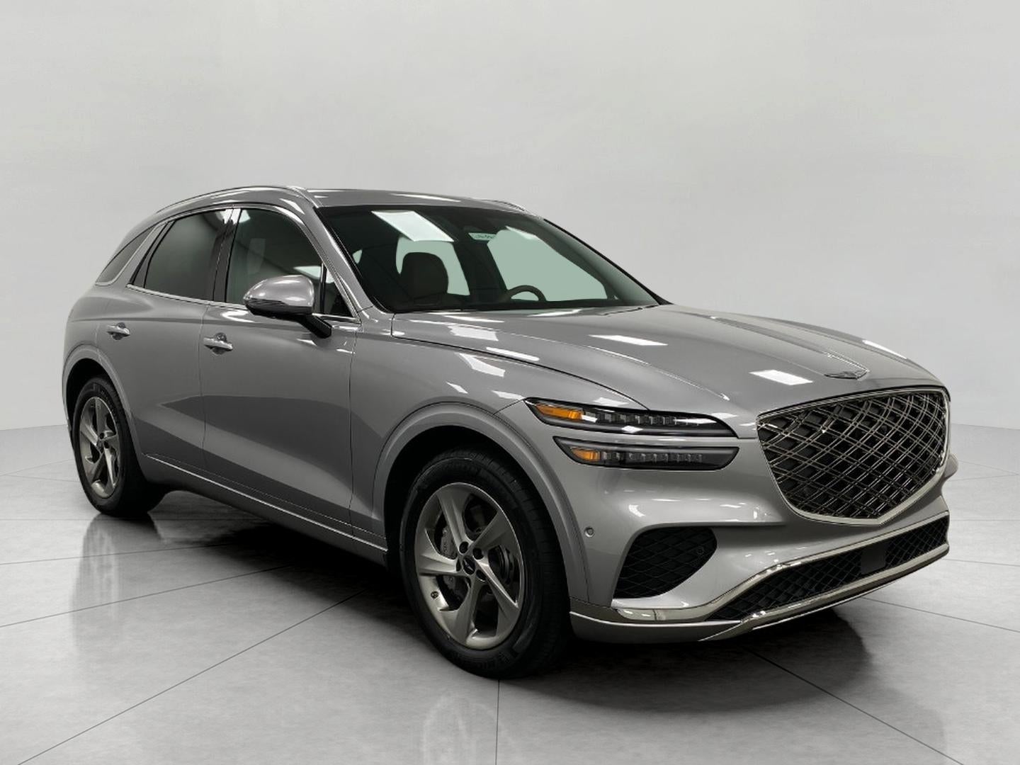 2026 Genesis GV70 2.5T Advanced AWD in Savile Silver — front three-quarter view