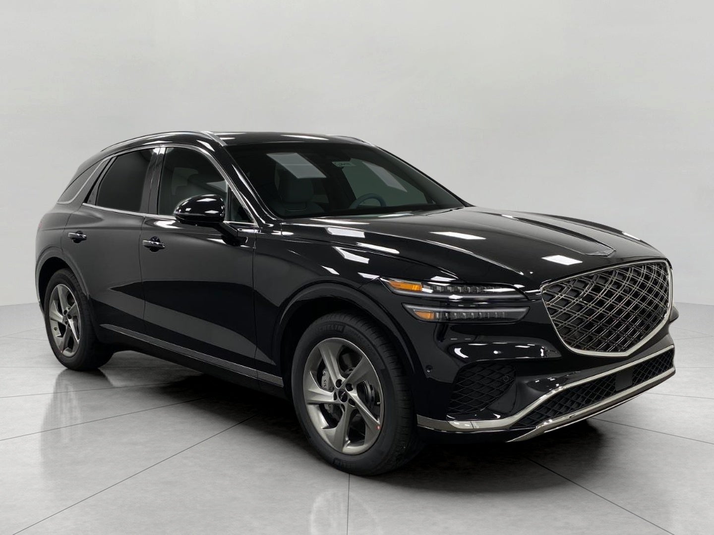 2026 Genesis GV70 2.5T ADVANCED in Vik Black — front three-quarter view