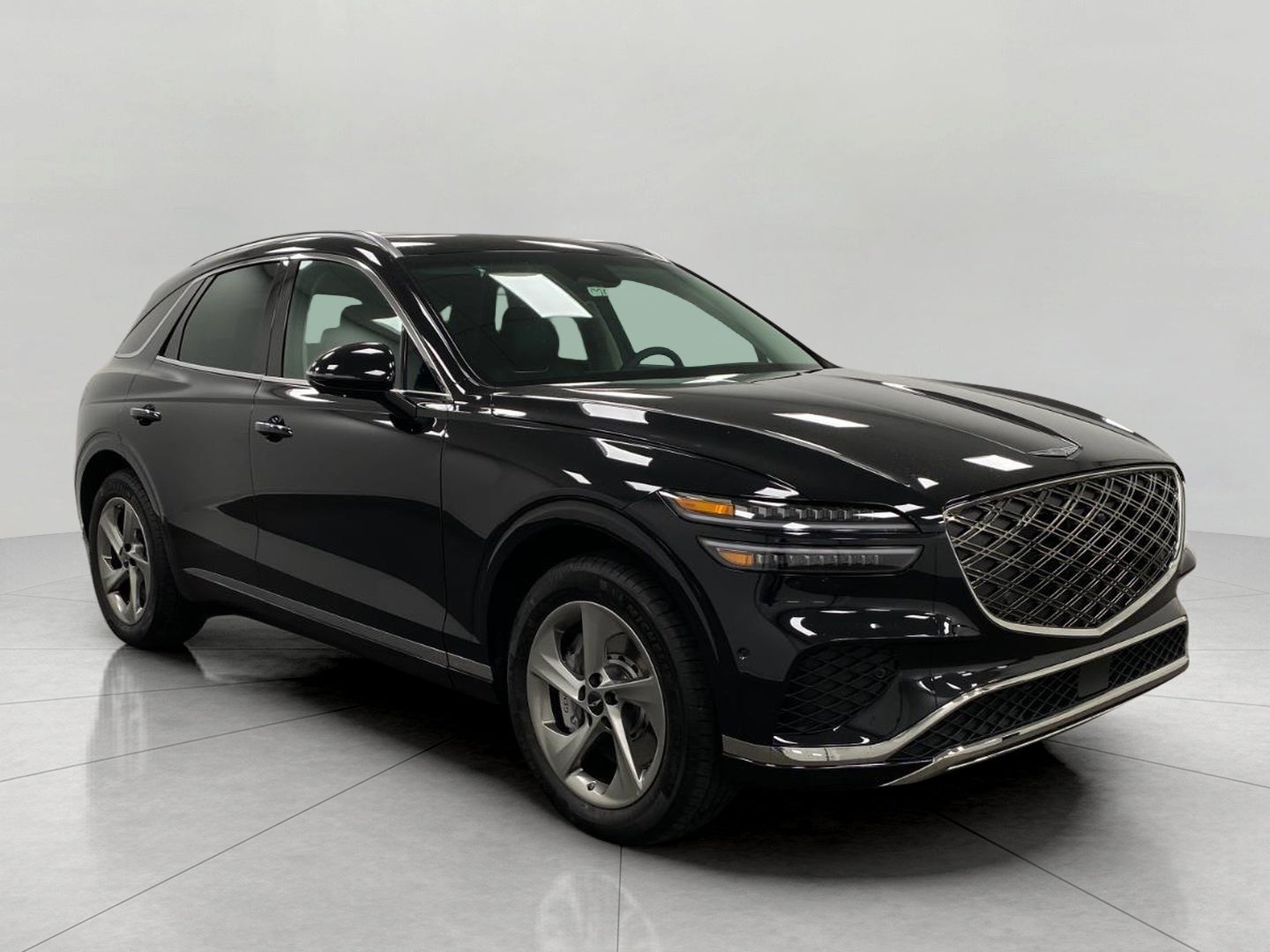 2026 Genesis GV70 2.5T ADVANCED in Vik Black — front three-quarter view