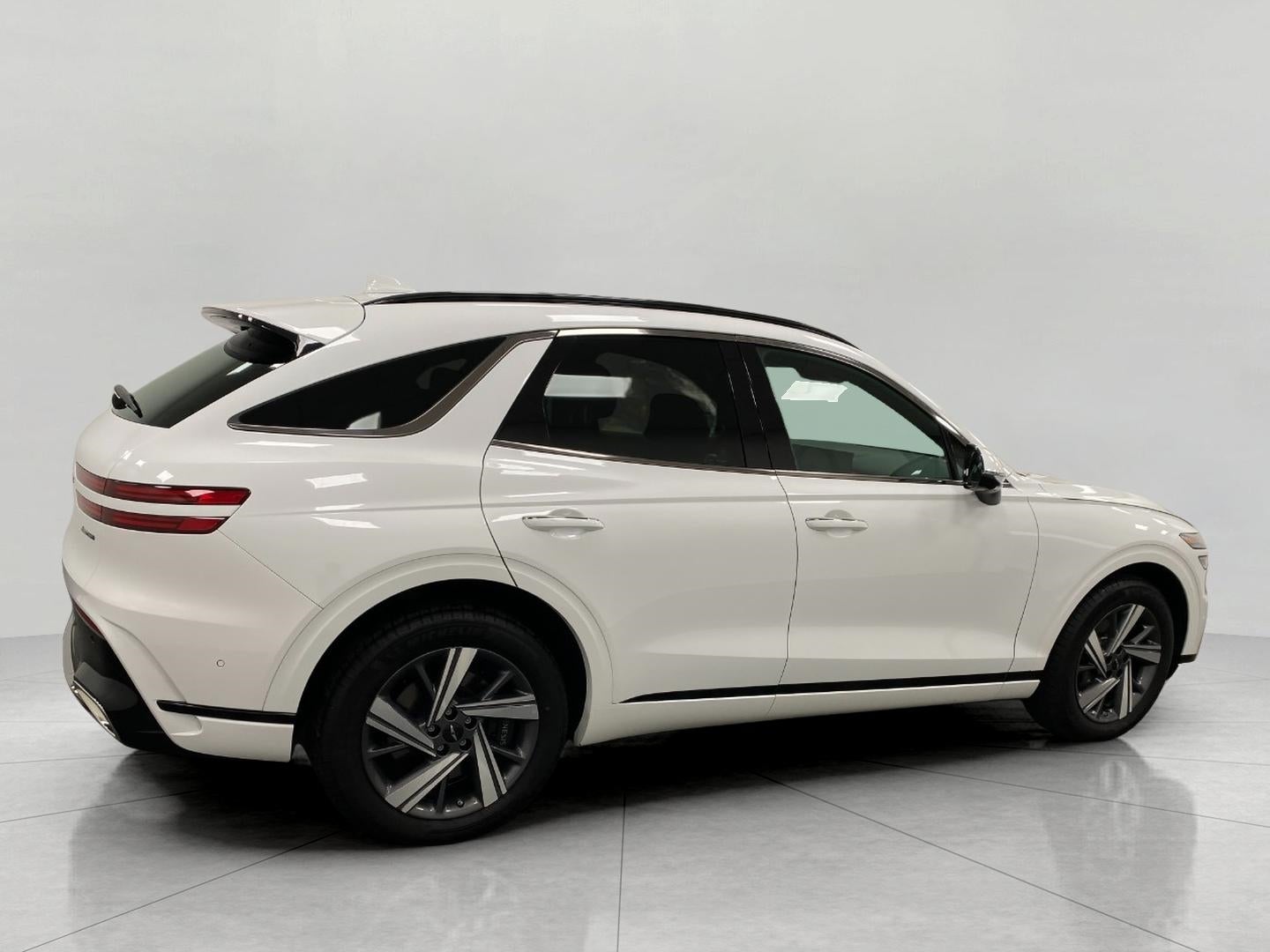 2026 Genesis GV70 — rear three-quarter view
