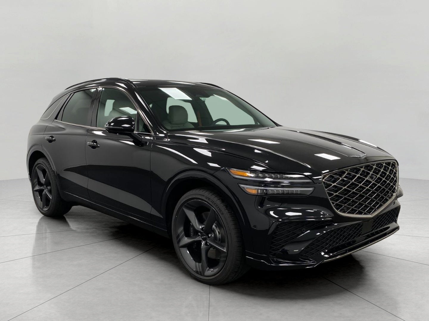 2026 Genesis GV70 3.5T SPORT PRESTIGE in Vik Black — front three-quarter view
