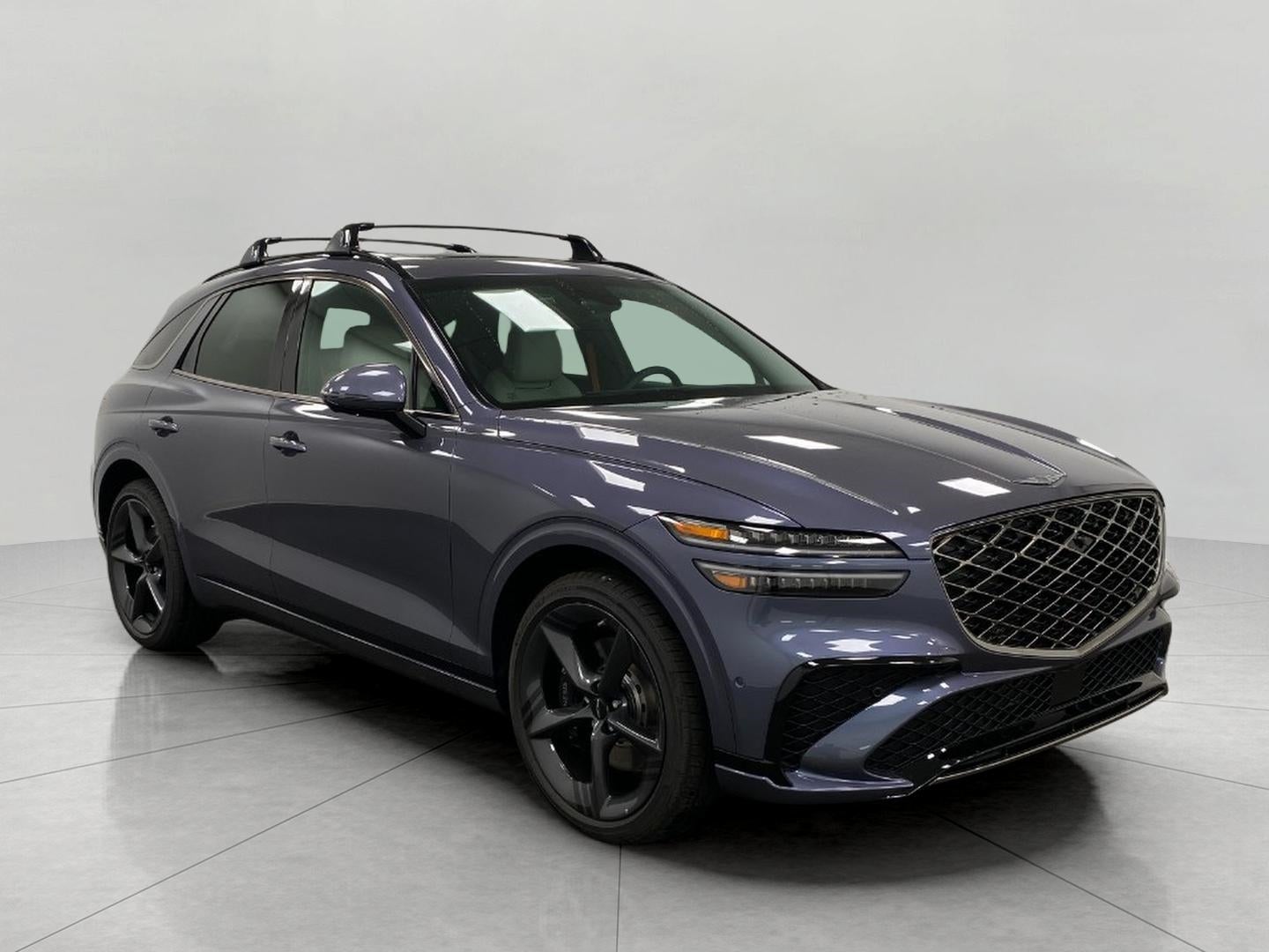 2026 Genesis GV70 3.5T SPORT PRESTIGE in Ceres Blue — front three-quarter view