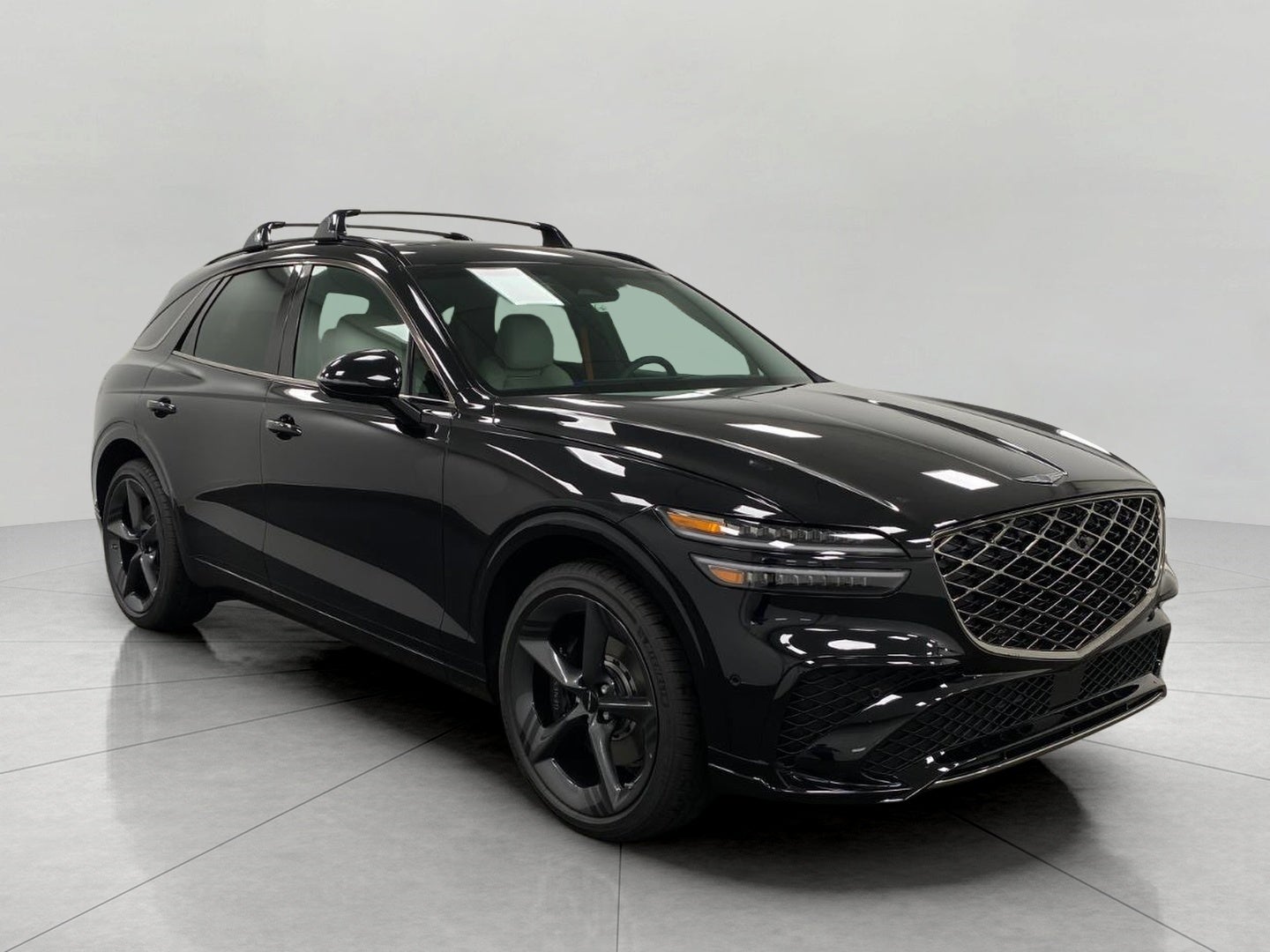 2026 Genesis GV70 3.5T SPORT PRESTIGE in Vik Black — front three-quarter view