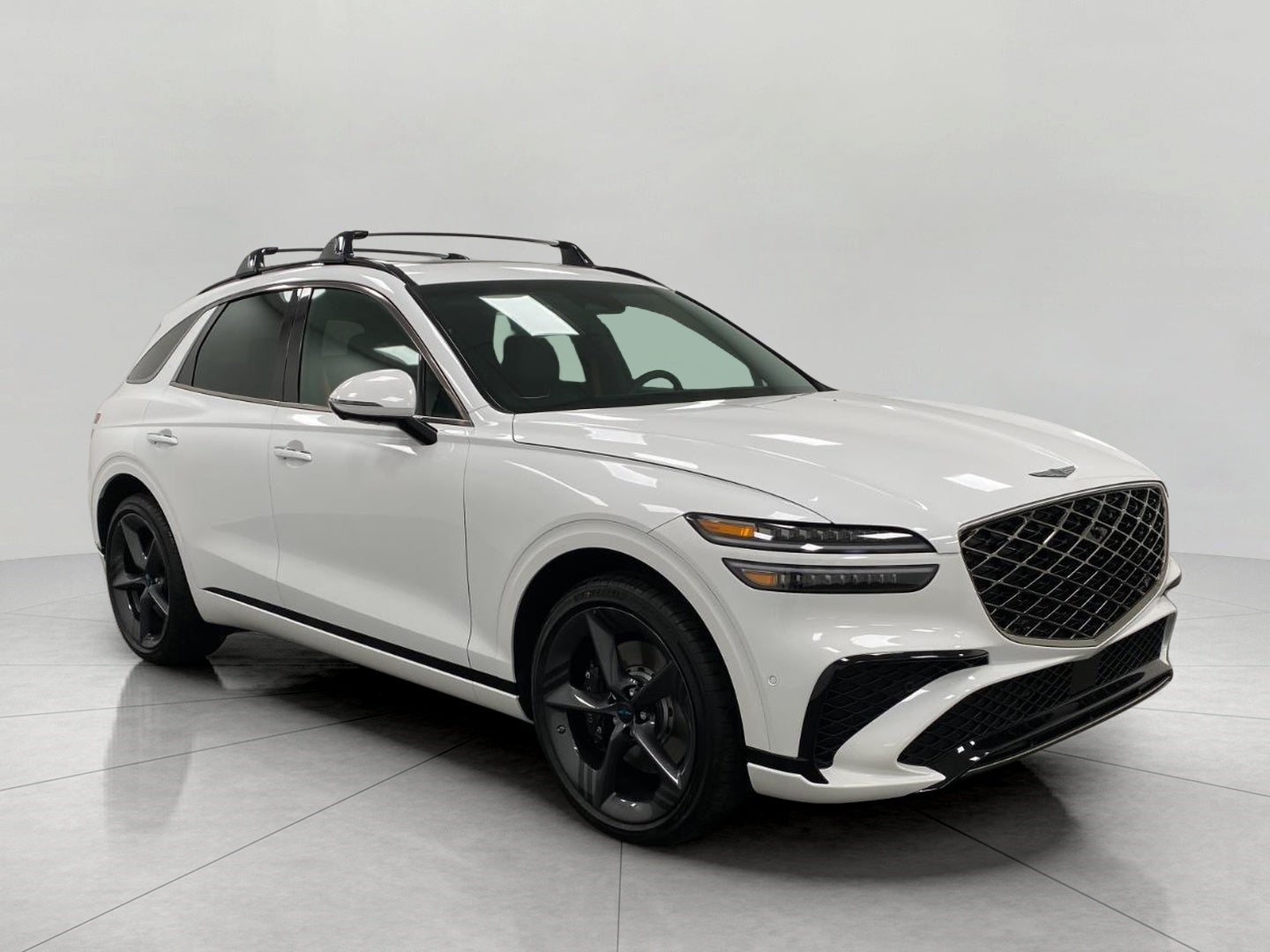 2026 Genesis GV70 2.5T SPORT PRESTIGE in Uyuni White — front three-quarter view