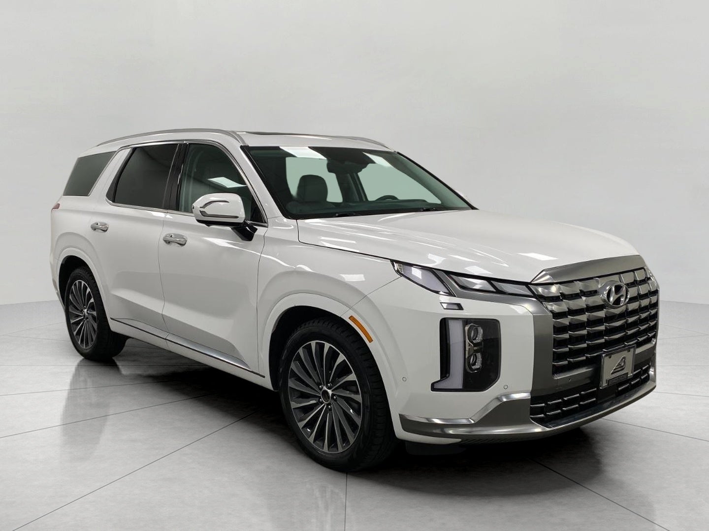 2025 Hyundai Palisade Calligraphy AWD in Hyper White — front three-quarter view