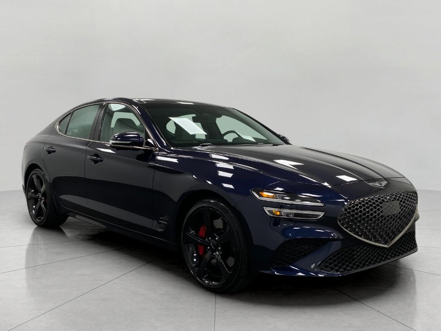 2026 Genesis G70 3.3T Sport Prestige AWD in Capri Blue — front three-quarter view
