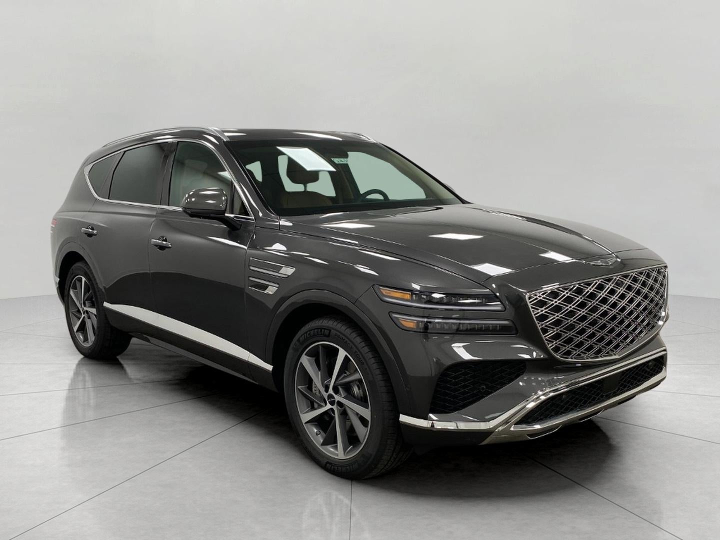 2026 Genesis GV80 2.5T ADVANCED in Makalu Gray — front three-quarter view