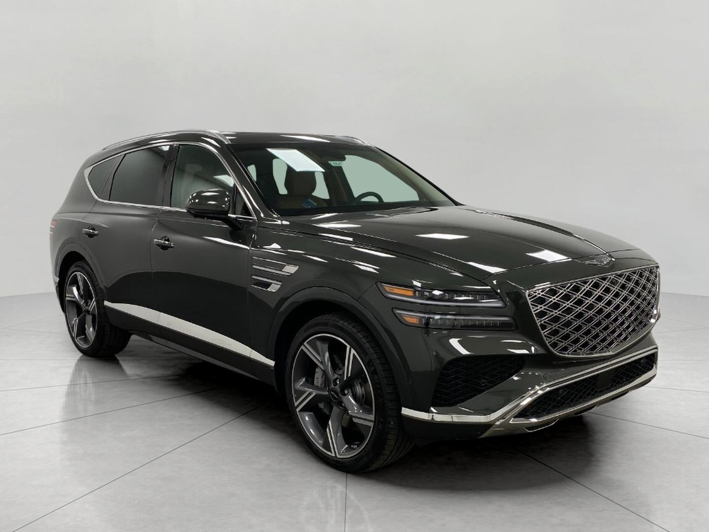 2026 Genesis GV80 2.5T PRESTIGE in Storr Green — front three-quarter view