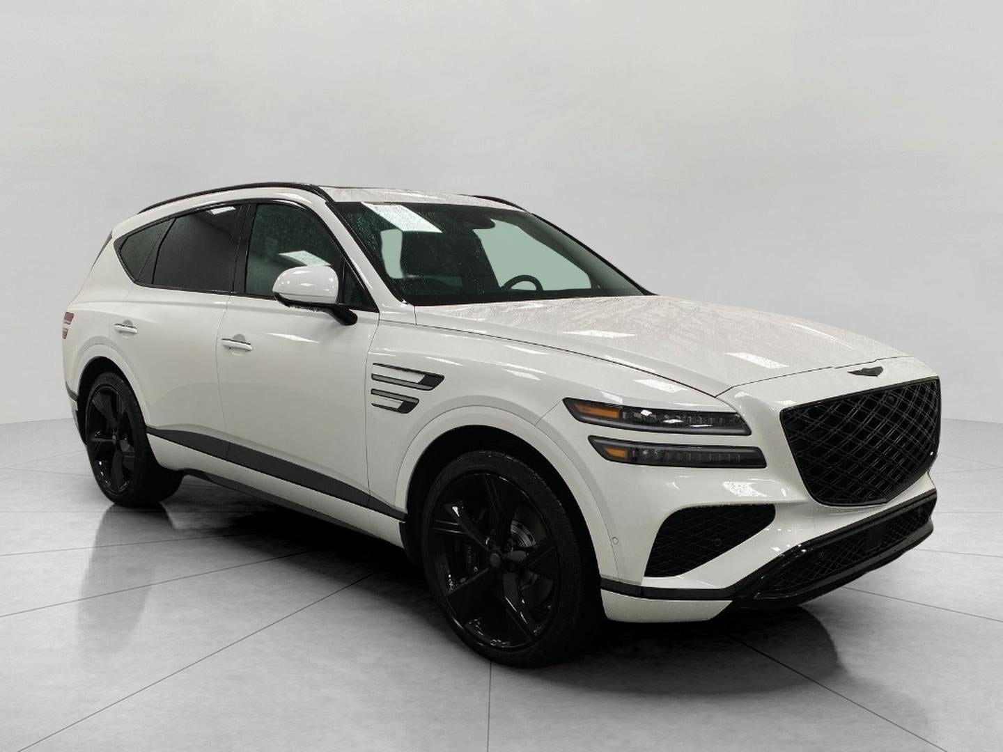 2026 Genesis GV80 2.5T PRESTIGE BLACK in Uyuni White — front three-quarter view
