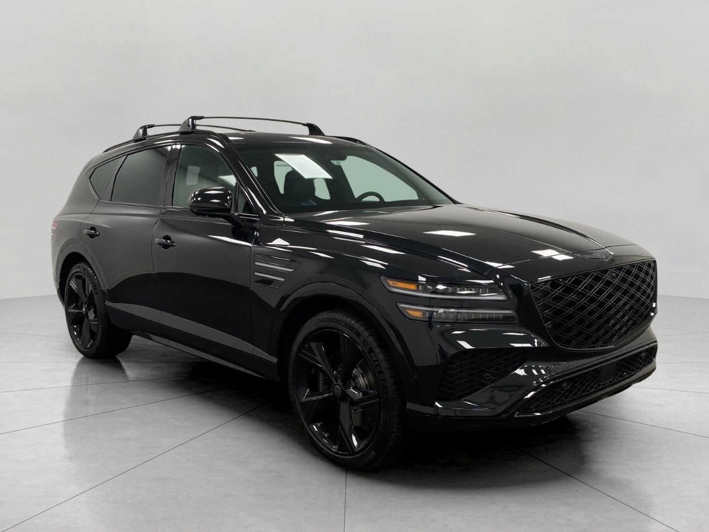 2026 Genesis GV80 2.5T PRESTIGE BLACK in Vik Black — front three-quarter view
