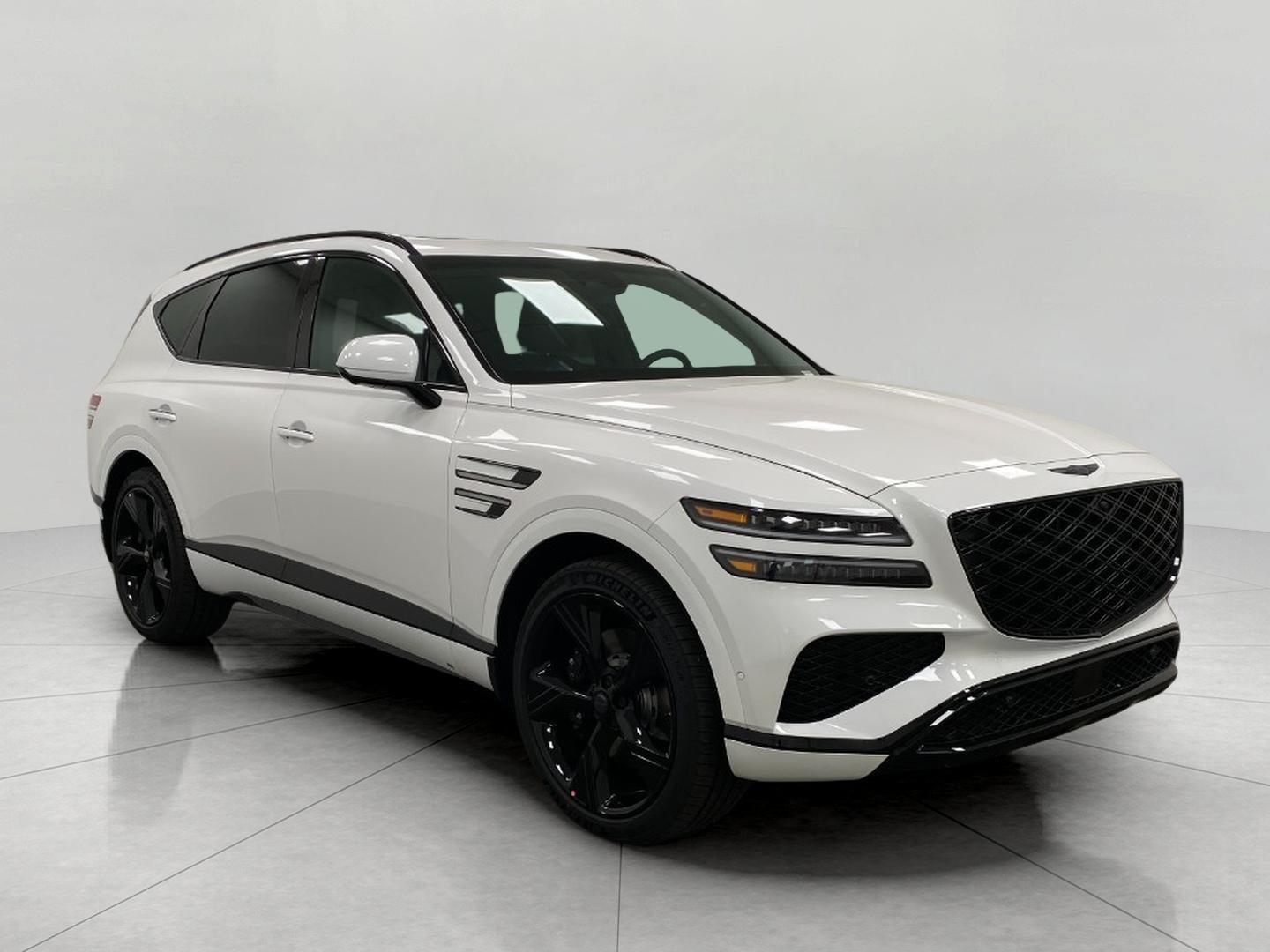 2026 Genesis GV80 2.5T PRESTIGE BLACK in Uyuni White — front three-quarter view