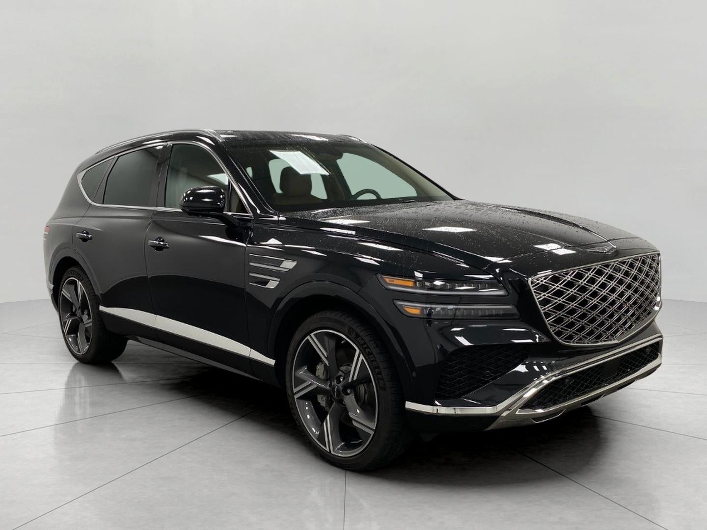 2026 Genesis GV80 3.5T Prestige AWD in Vik Black — front three-quarter view