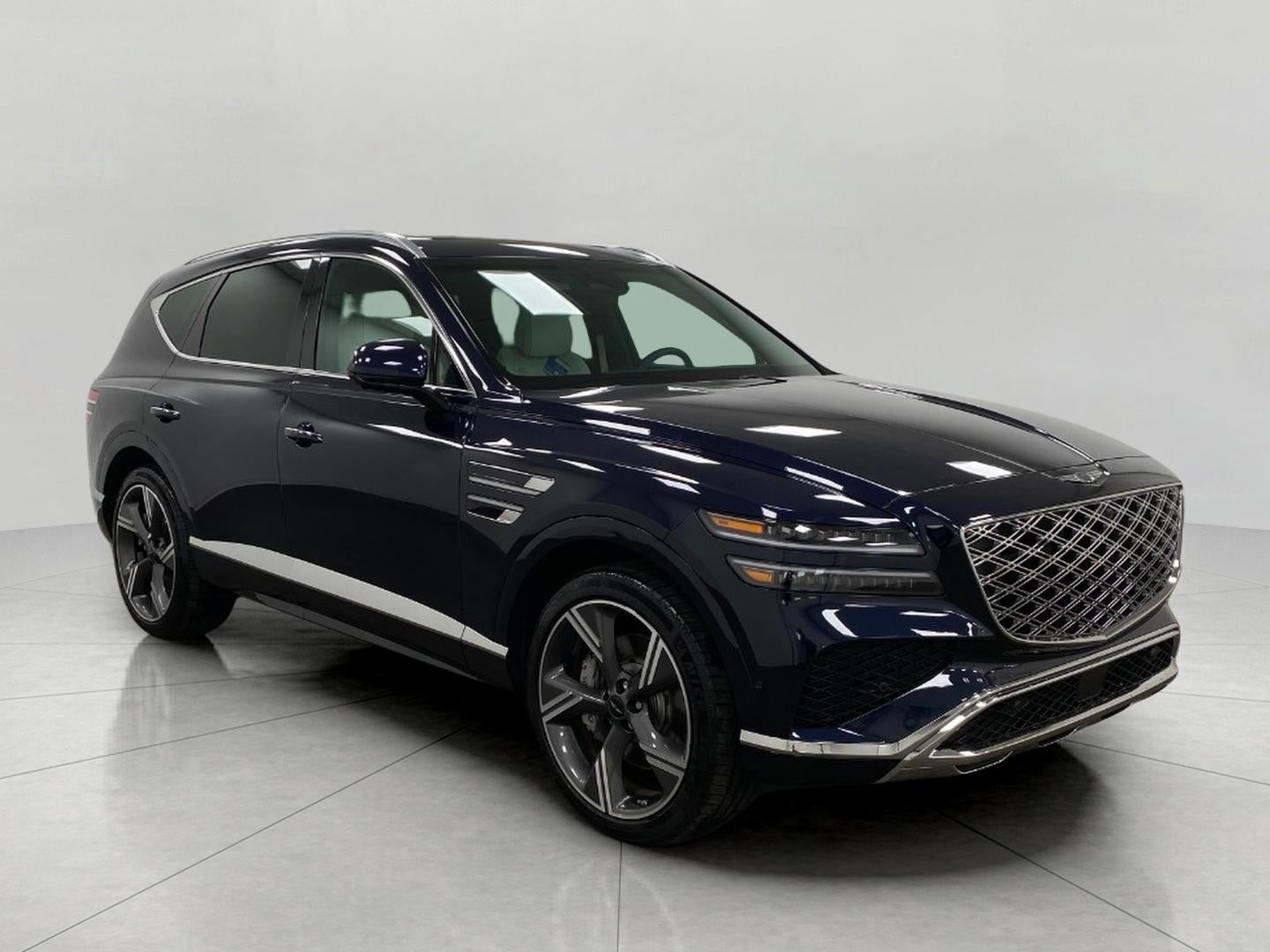 2026 Genesis GV80 3.5T Prestige AWD in Capri Blue — front three-quarter view