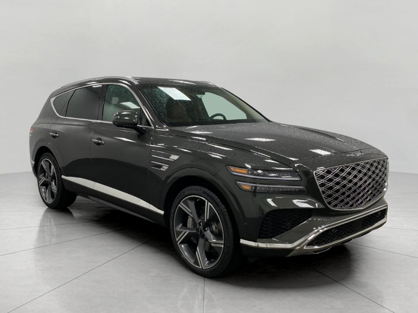 2026 Genesis GV80 3.5T PRESTIGE in Storr Green — front three-quarter view