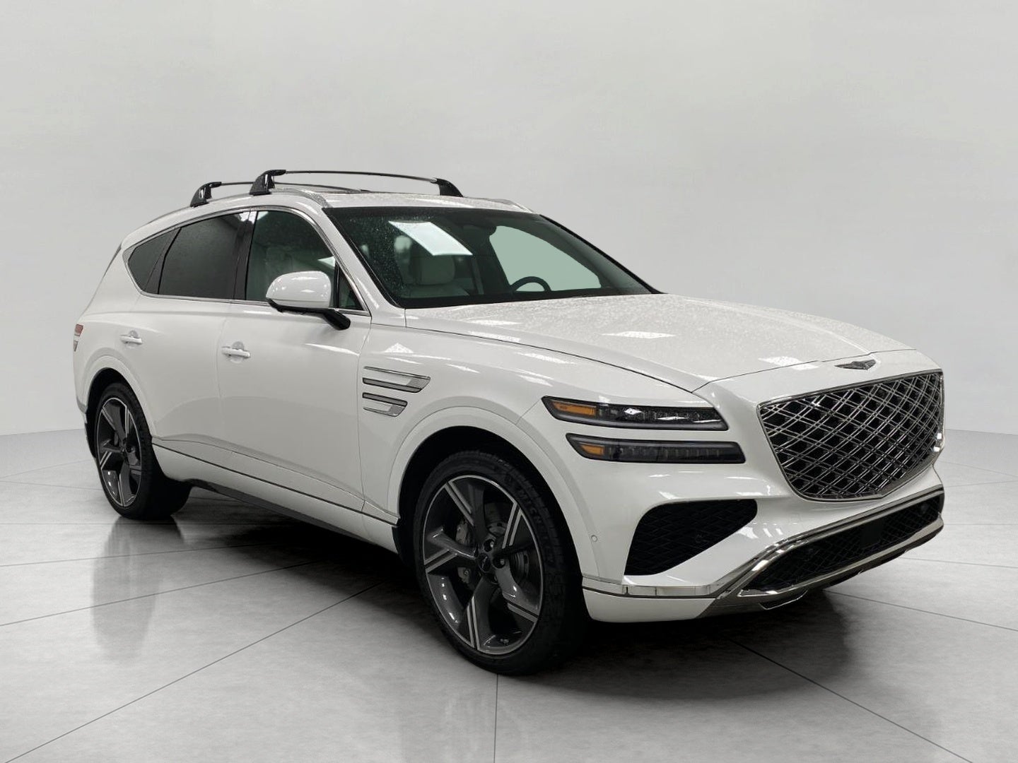 2026 Genesis GV80 3.5T PRESTIGE in Uyuni White — front three-quarter view