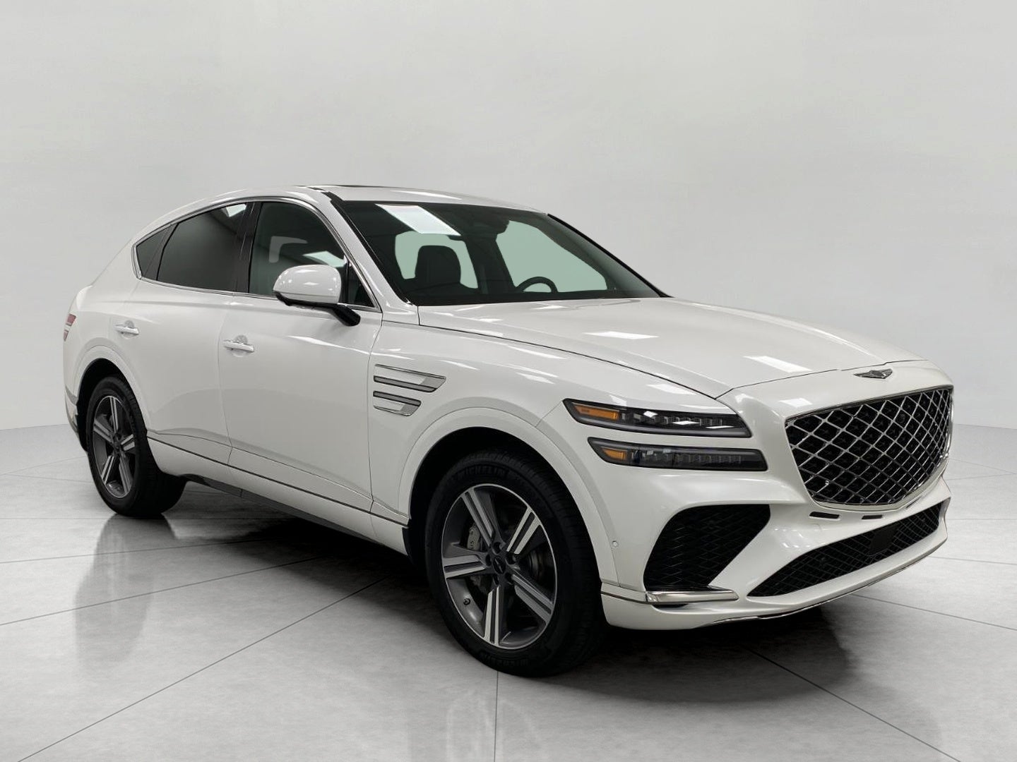 2025 Genesis GV80 Coupe 3.5T AWD in Uyuni White — front three-quarter view
